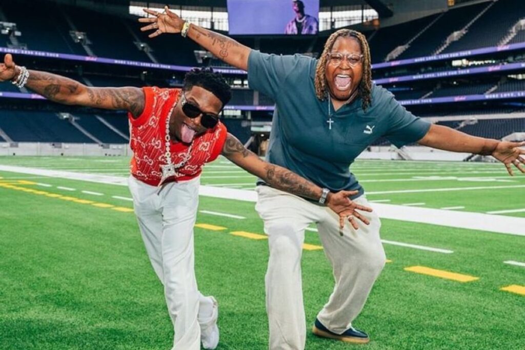 Afrobeats superstar Wizkid and BBC Radio 1Xtra host Remi Burgz before his sold out show at the Tottenham Hotspur stadium.